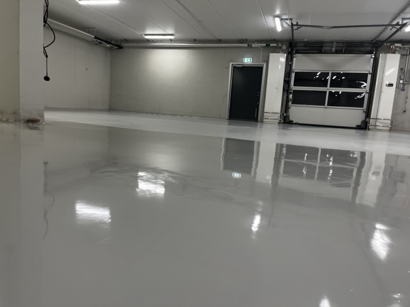 Garagegolv med UQESH® PF och TAP750 hos Hägernäshuset